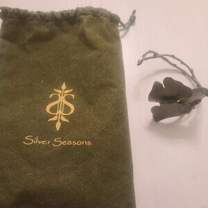 Rare metal green leaf bracelet